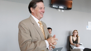 Former House Majority Leader Tom DeLay, R-Sugar Land, speaks with media at the 331st District Court of Travis County during the pretrial hearings on money laundering charges against the former congressman.