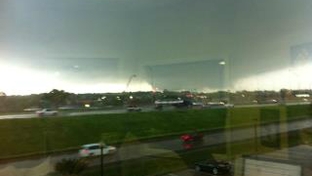 US Rep. Joe Barton tweeted this photo of a tornado visible from his district office in Arlington — Tuesday, April 3, 2012.