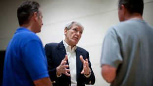 5/12/12  Texas U.S. Senate candidate Tom Leppert talks to members of the community (left and right) Michael Osuna and Steve Chappell  at the Christ Fellowship Church in  McKinney, TX during a candidate meet and greet.