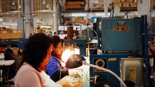 Factory workers in Ciudad Juárez assemble components for hair dryers on a manufacturing line managed by El Paso-based TECMA, an outsourcing company that had one of the best years on record in 2009. Last year’s success came despite Ciudad Juárez logging more than 2,600 murders.  

