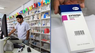 A pharmacy employee in Nuevo Progreso, Tamaulipas, holds a box of Cytotec. The medication is intended to treat ulcers but has been used by women as an abortion pill.