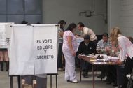 Voters line up to cast ballots in Mexico's presidential election Sunday at a voting sight on Popocatepetl street in Mexico City's Colonia Condesa.
