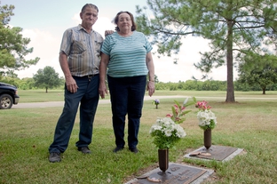 Steven Hardin's parents, photographed near his burial plot. 