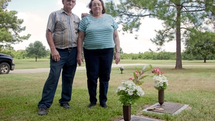 Steven Hardin's parents, photographed near his burial plot. 