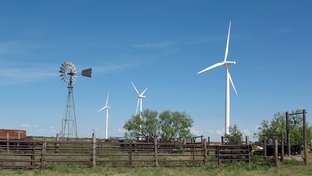 New turbines tower over an old windmill at the Whirlwind wind
farm, near Floydada