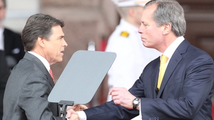 Lt. Gov. David Dewhurst shakes hands with Gov. Rick Perry at the 2011 inauguration.