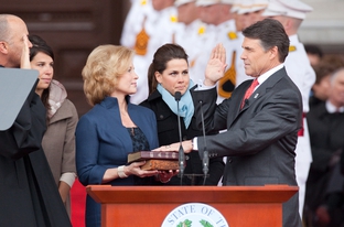 Gov. Rick Perry swears into office in 2011.