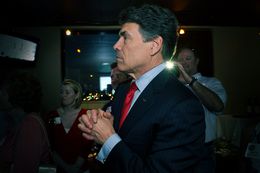 Gov. Rick Perry on May 29, 2012, watching television returns after speaking at the party for Charles Schwertner's victory in the Texas Senate race for District 5.