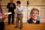 A painting of Ronald Reagan sits off to the side as New Jersey Gov. Chris Christie speaks to the Michigan delegation at the Republican National Convention in Tampa, Florida, August 28, 2012.