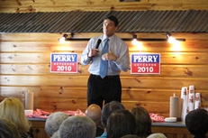 Gov. Rick Perry, campaigning at a barbecue restaurant in Temple.