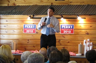 Gov. Rick Perry, campaigning at a barbecue restaurant in Temple.