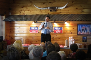 Gov. Rick Perry, campaigning at a barbecue restaurant in Temple.