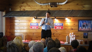 Gov. Rick Perry, campaigning at a barbecue restaurant in Temple.