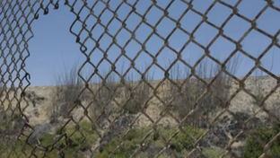 Screen grab from Bill White's "Border" television spot.