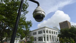 A security camera keeps watch on the newly-restored Texas Governor's Mansion on July 18, 2012.