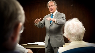 Texas State Sen. Kirk Watson, D-Austin, presents his plans for a medical school before the West Austin Democrats.
