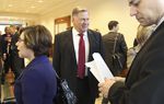 Tom Suehs waiting outside Senate committee hearing on January 31, 2011.