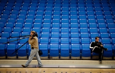 Men's assistant basketball coach Zak Buncik takes in the new center during a press conference at  The University of Texas Arlington  College Park Center. The 7000 seat event center opens February 1, 2012.