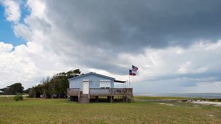 Bill and Gail Mullinax's 720-square-foot Laguna Madre cabin is accessible only by boat. It is about a 10-minute ride from the nearest marina in Corpus Christi, where the couple lives.