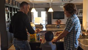 Brian Stephens, left, and Andy Miller with their son, Clark, on Jan. 21, 2013, in Austin.
