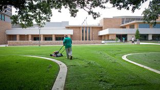 Landscaping workers are among the Texas A&M University employees who will have to join an outside company, because A&M is outsourcing its support services.