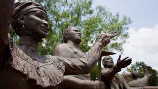 Statues built as a tribute to Juneteenth for the Texas Capitol grounds sit weathering at the Deep In The Heart of Texas Art Foundry property.