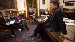 Gov. Rick Perry meets with senior staff members at his office in the state Capitol on Jan. 9, 2013.