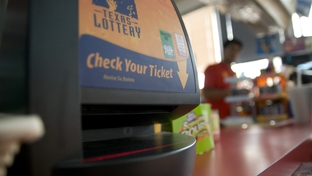 "Check your ticket" lottery machine in an Austin, TX gas station.