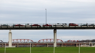 The bridge across the Rio Grande that connects Eagle Pass, Texas, to Piedras Negras, Coahuila, Mexico, Saturday, February 4, 2012.