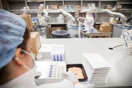 A pharmacy technician loads pills into punch cards at the Texas Department of Criminal Justice's pharmacy in Huntsville on Wed. Sept. 19, 2012.