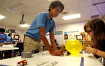 Sophomore student Miguel Nava works on a science experiment at the San Juan Idea Public Schools Tuesday morning in San Juan, Texas November 23, 2010.