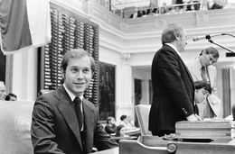 Whitmire at the front of the House chamber during the 64th session in 1975. House Speaker Billy Clayton is at the podium.