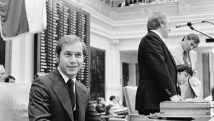 Whitmire at the front of the House chamber during the 64th session in 1975. House Speaker Billy Clayton is at the podium.
