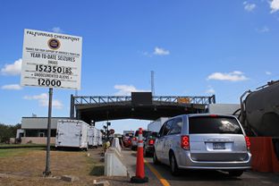 U.S. Border Patrol checkpoint in Falfurrias, Texas, Aug. 14. Illegal women seeking a second trimester abortion at clinics on the other side of the station are wary of trying to cross. A large sign shows drivers how many drugs and undocumented aliens have been seized in the last year.
