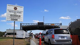 U.S. Border Patrol checkpoint in Falfurrias, Texas, Aug. 14. Illegal women seeking a second trimester abortion at clinics on the other side of the station are wary of trying to cross. A large sign shows drivers how many drugs and undocumented aliens have been seized in the last year.