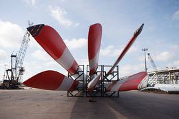 Stacks of huge blades, destined to go to wind farms in the United States, arrive at the Port of Houston docks on Sept. 6, 2012.