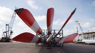 Stacks of huge blades, destined to go to wind farms in the United States, arrive at the Port of Houston docks on Sept. 6, 2012.