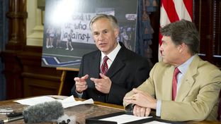 Attorney General Greg Abbott, left, and Gov. Rick Perry