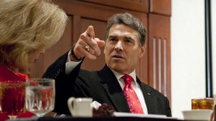 Gov. Rick Perry with wife Anita at a Williamson County Republican dinner in Round Rock, his first public appearance since leaving the presidential race.