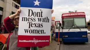 Planned Parenthood’s “Don’t Mess with Texas Women” tour bus made a stop near the University of Texas in Austin on Tuesday afternoon. The organization hopes to raise awareness of cuts to women’s health programs that it blames on Texas Gov. Rick Perry. Planned Parenthood’s Texas clinics will lose funding on March 14 from the Texas’ Medicaid Women’s Health Program, which serves some 130,000 low-income women.