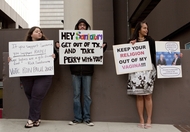 A small group protesting Republican presidential candidate Rick Santorum during his fundraising visit to downtown Austin on Feb. 24, 2012.