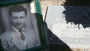 A photograph of Marcos Guerra at the gravesite in San Benito, Texas.