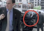 Screengrab of Perry's staffer heading to block a KBH videographer from the sidewalk.
