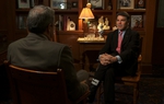 Gov. Rick Perry says cities shouldn't require police officers to do immigration checks but shouldn't prevent it, either.