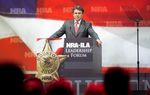 Just like a baseball player's "walk-up" song, Gov. Rick Perry emerged from the dugout at the National Rifle Association's 2013 annual meeting after this video of him laying waste to a perfectly good farm egg and some other targets.
