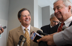 During a break in Wednesday's pretrial hearing, former U.S. Rep. Tom DeLay, R-Sugar Land, and his lawyer, Dick DeGuerin, discuss a poll that shows a significant portion of potential jurors in Travis County already believe he's guilty. They're using the numbers to argue for a change of venue in the state's money laundering case against DeLay.
