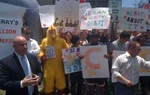 In our latest HuTube vlog post, we venture to a Team Perry press conference at Bill White's Austin headquarters. White's volunteers must have had some advance notice. They came armed with signs, chants — and a guy in a chicken suit — to shout over the governor's spokesman.