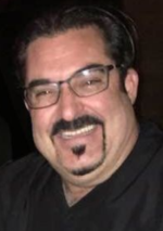 John Conrad Achziger (1970 - 2019)