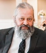 Keith E. Ackley