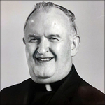 Rev. James  A. Woods, SJ